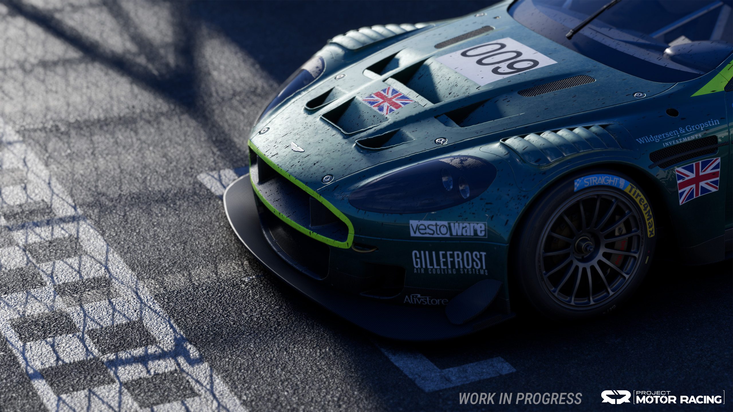 Close-up of a British race car crossing the finish line in Project Motor Racing