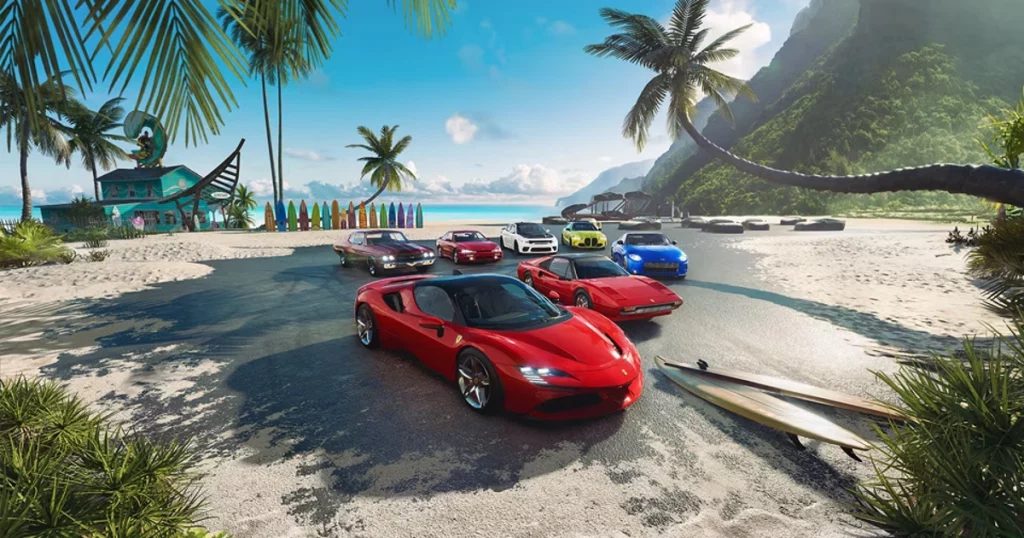 A group of sports cars parked on a sunny beach in Hawaii with palm trees, surfboards and mountains in the background.